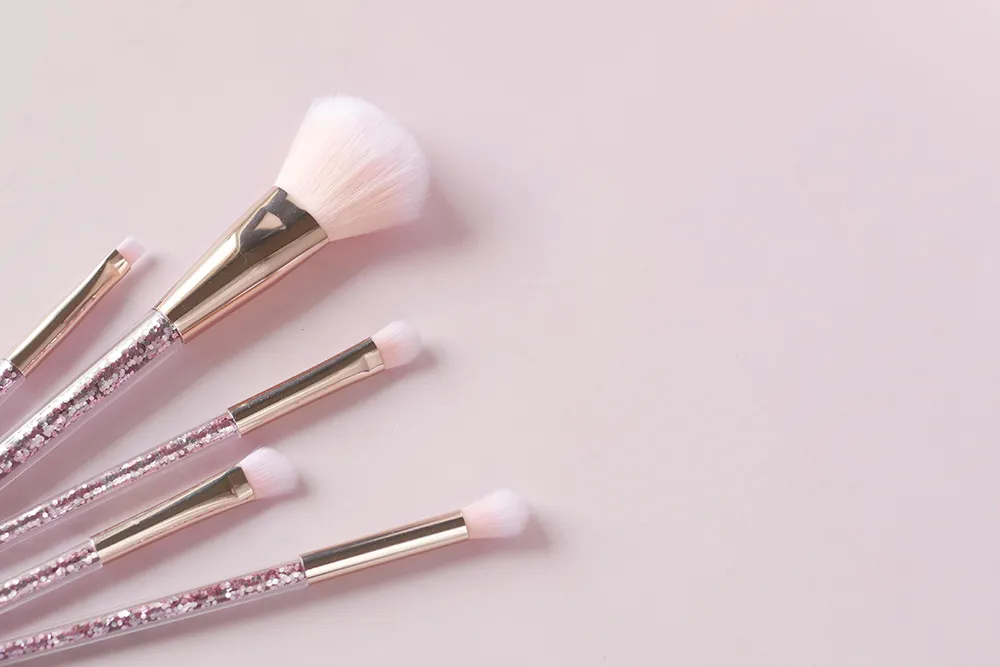 A grouping of makeup brushes made ready for a make sessions